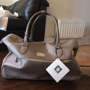 Perfect condition Anne Klein roller carry on bag
